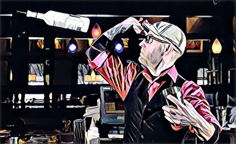 "Flair bartending instruction at the school in Miami, featuring an instructor demonstrating bottle tossing techniques."
