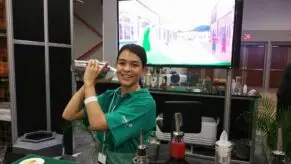 Bartending School Graduate Camilla bartending at the Miami Rum Festival