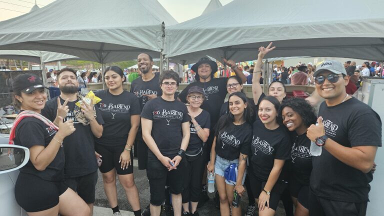 786-Bartend students posing at Calle Ocho 2025 festival in Little Havana after working event beer tents