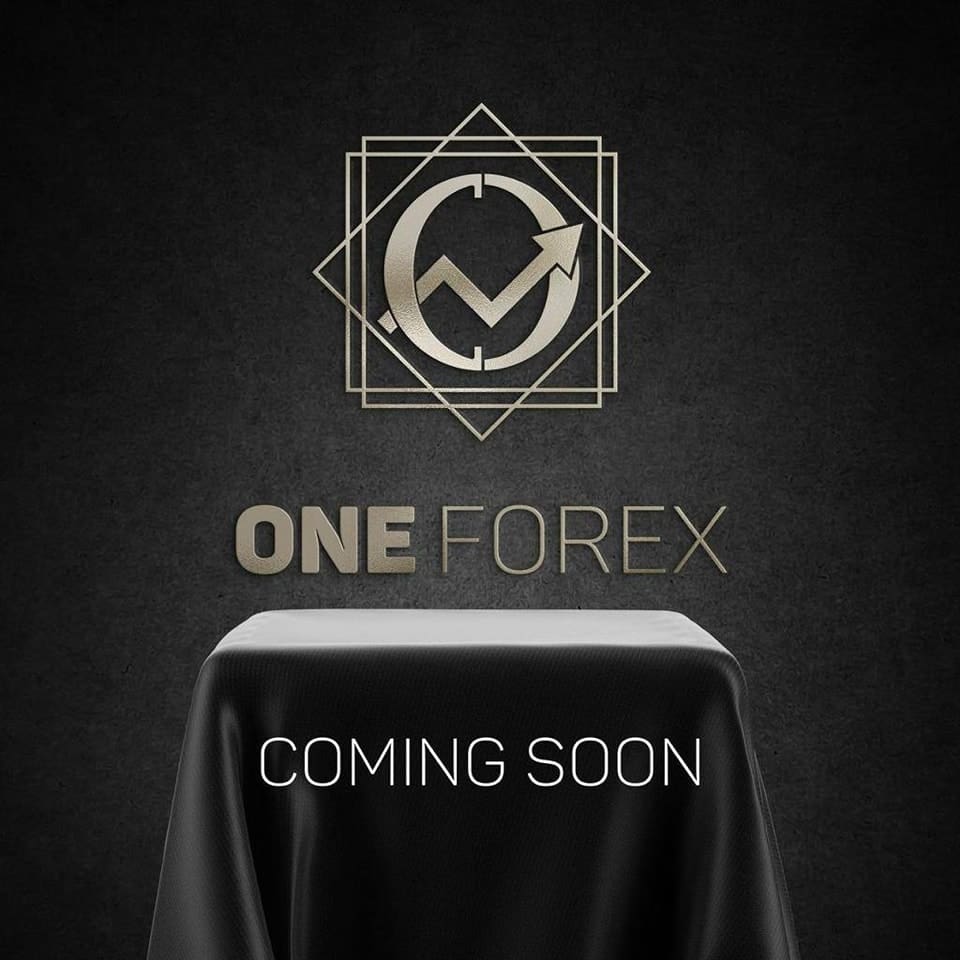 The words "ONE FOREX" and the logo are drawn on a draped object on a black background. The words "COMING SOON First Release" are prominently displayed on the cloth covering the object.