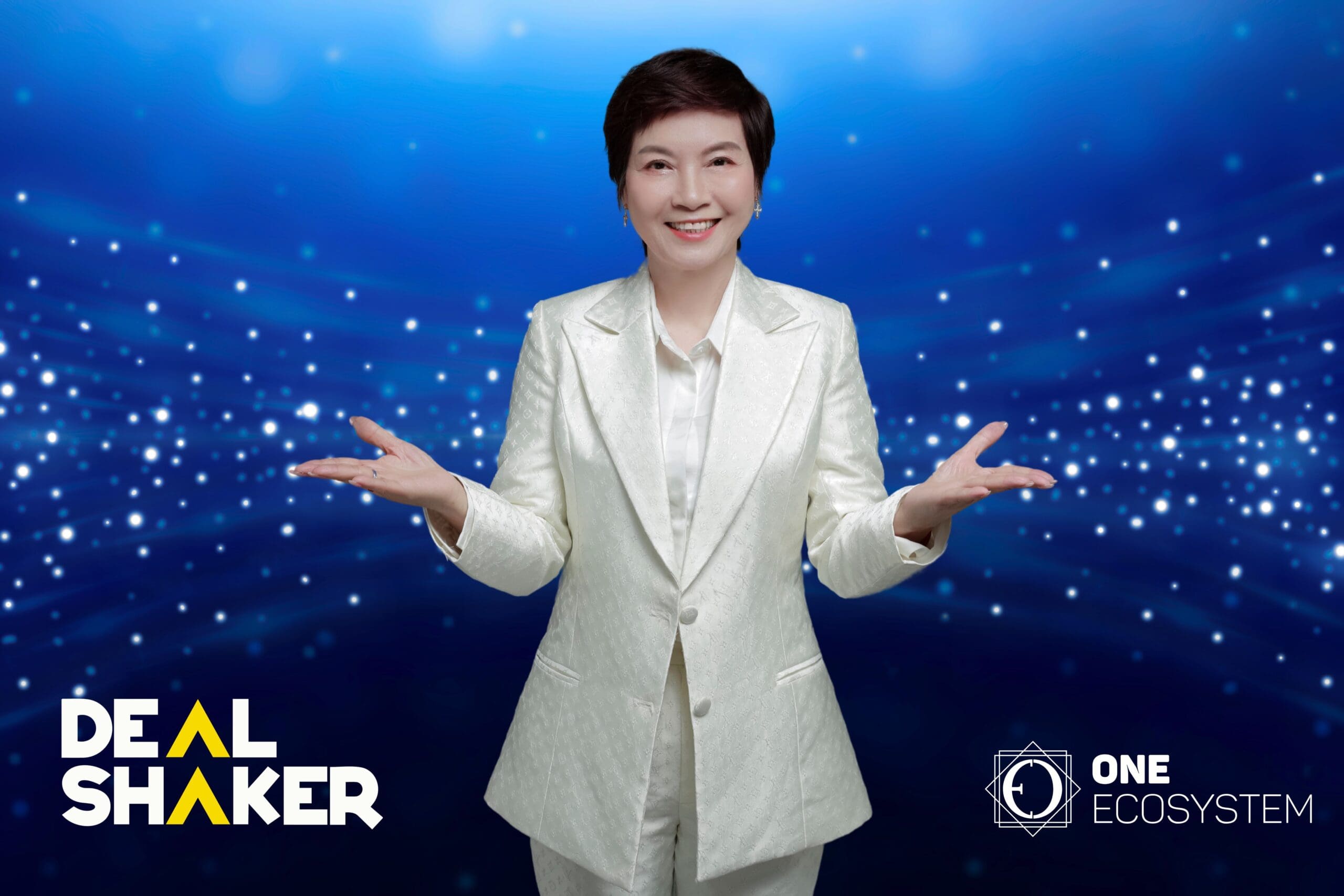 A figure in a white suit stands with outstretched arms and a smile on a blue background, embodying the charm of Vietnam. The "Deal Shaker" and "One Ecosystem" logos are displayed in the corners, highlighting effective sales promotion strategies.