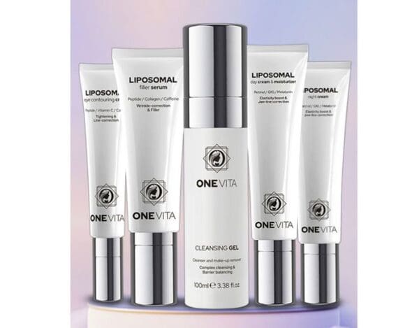 Liposomal creams, serums, cleansing gels, and five other skincare products from the ONE VITA gift box set are arranged in a semicircle on a gradient background. It's a product that promises a healthy glow every time you use it.