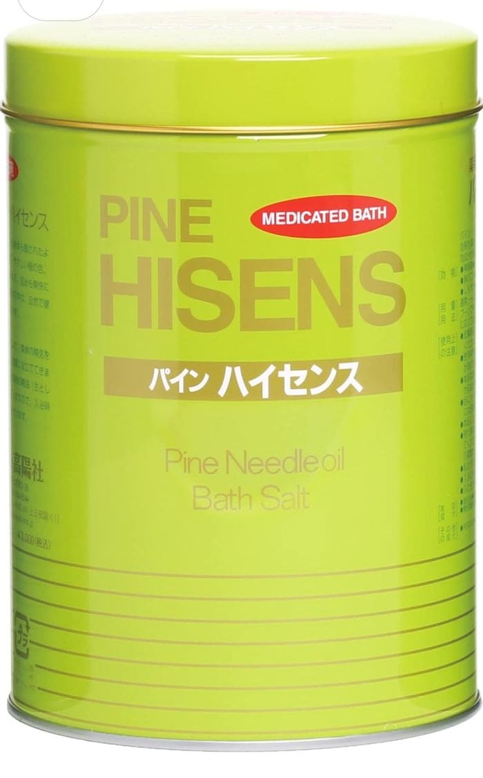 The bright green container labeled "Pine Hisense Medicinal Bath" has the words "Pine Needle Bath Salts" written in English and Japanese. This Pine Hisense Medicated Bath Salt 2.1kg can promises you an energizing experience every time you use it.